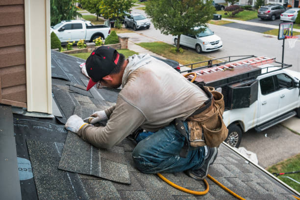 Professional Emergency Roof Repair technician working in Wheaton, MN